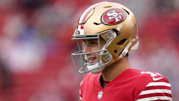 49ers quarterback Brock Purdy smiles during warmups before the wild-card game vs. the Seahawks.